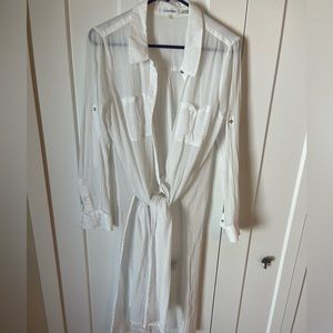 Long sleeved white bathing suit cover up